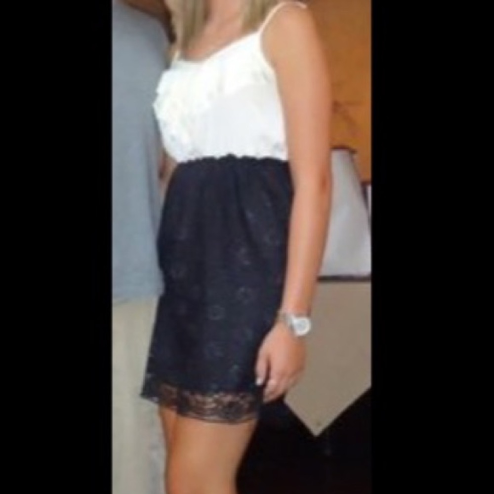 White and black ruffled lace dress