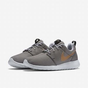 Nike grey and gold roshes