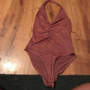 Never worn pink body suit