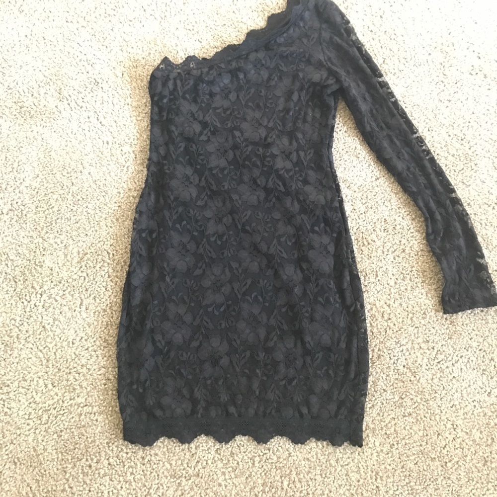 Black lace body con single sleeve mini dress.