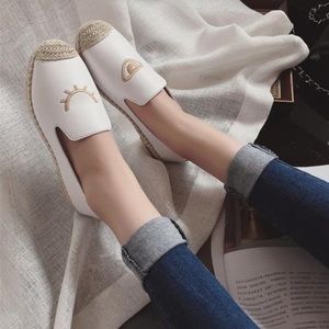 White espadrilles with gold embroidery