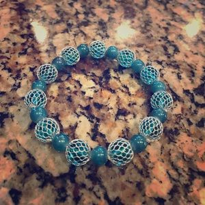 Blue caged beads bracelet