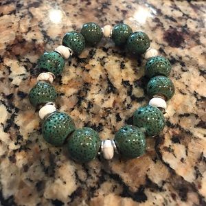 Green white and silver beaded bracelet