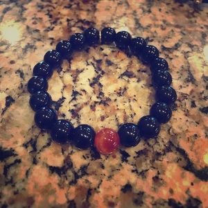 Black and orange beaded bracelet