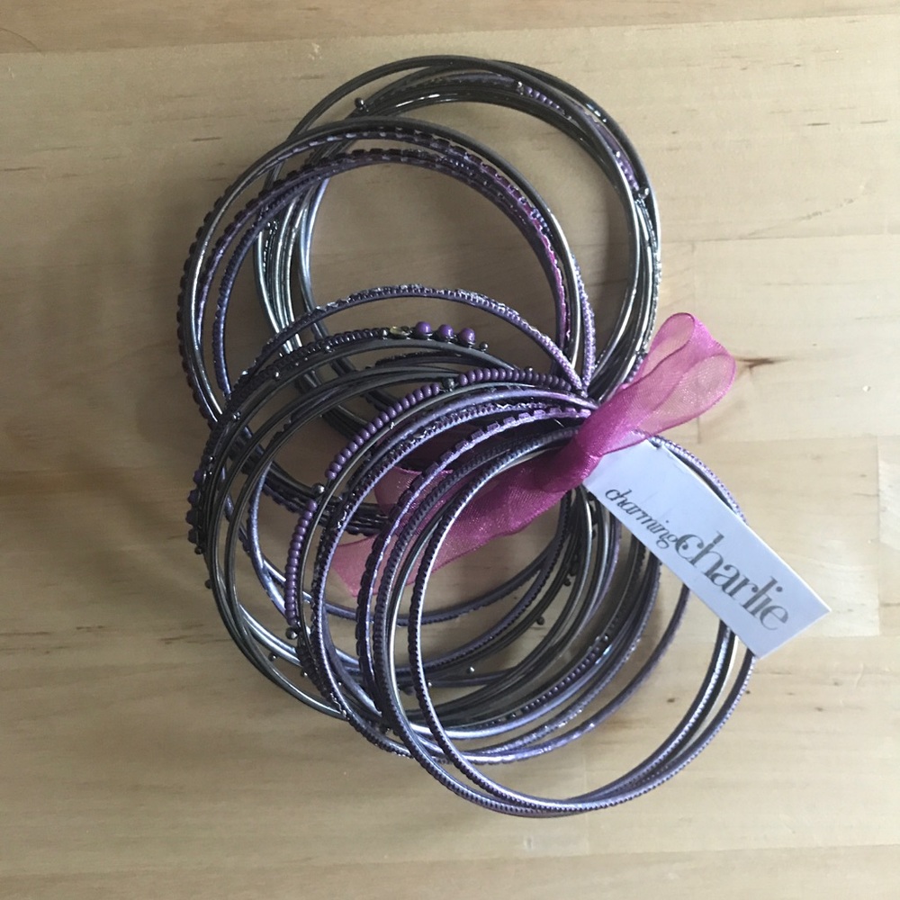 Set of purple silver metal bangles / bracelets.