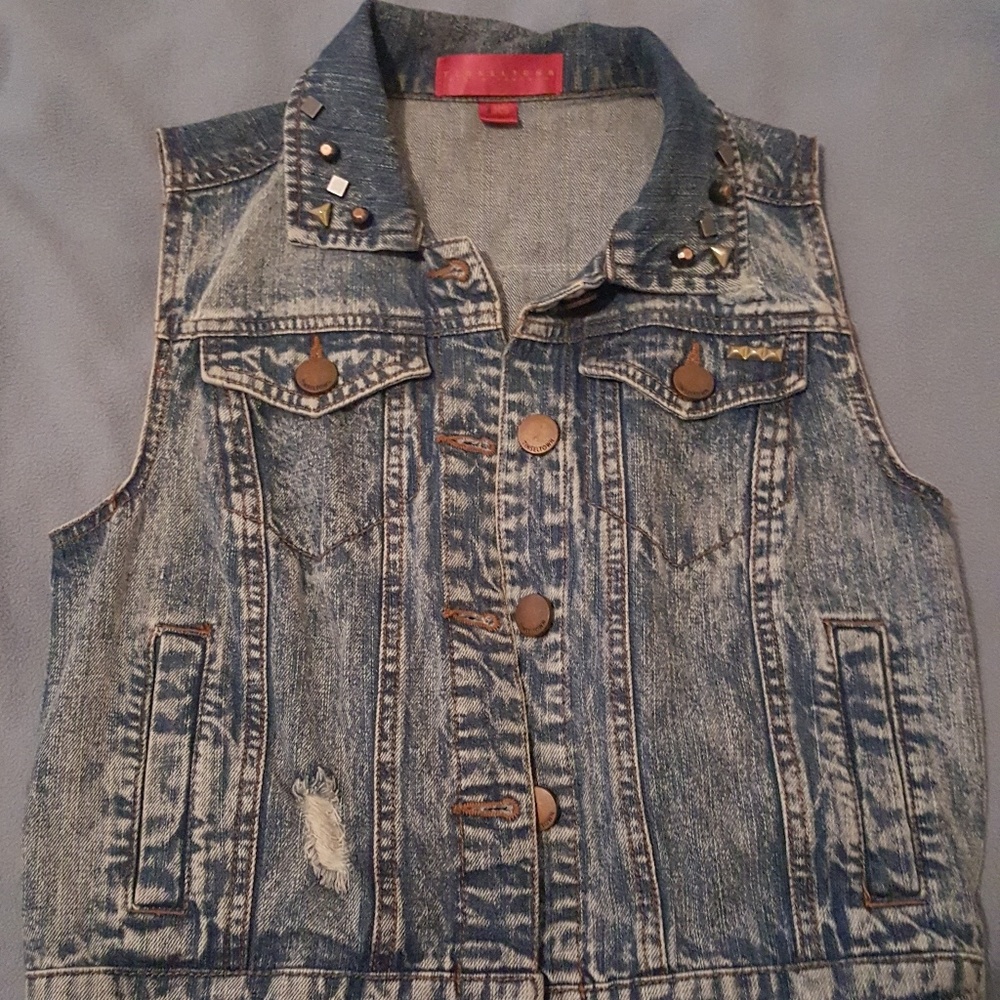 Denim vest with embroidered detail on back