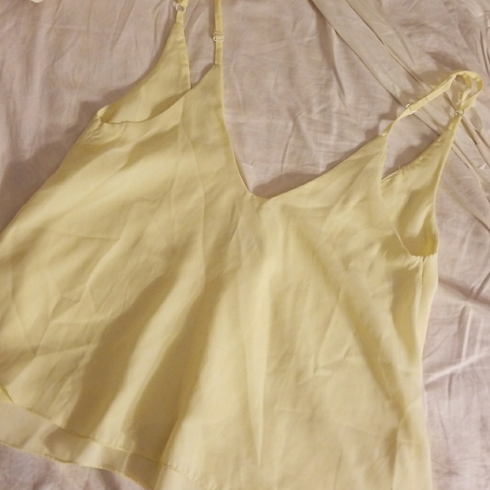Pale yellow flowy tank