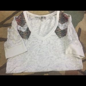 White half sleeve shirt with beautiful detail.