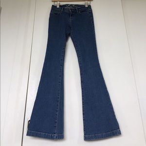Juicy Couture Medium Wash Denim with stretch Jeans