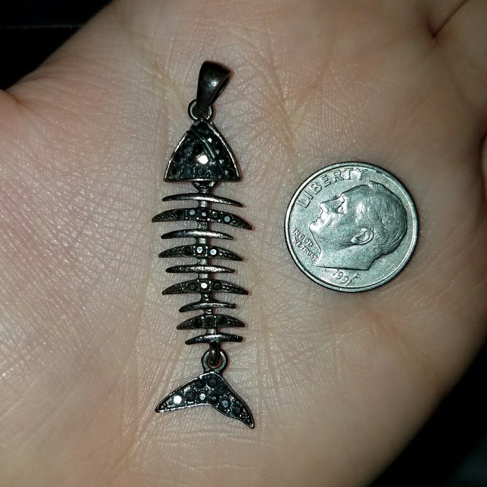 Black fish charm