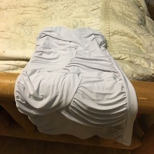 A white, skin tight, stretchy dress.