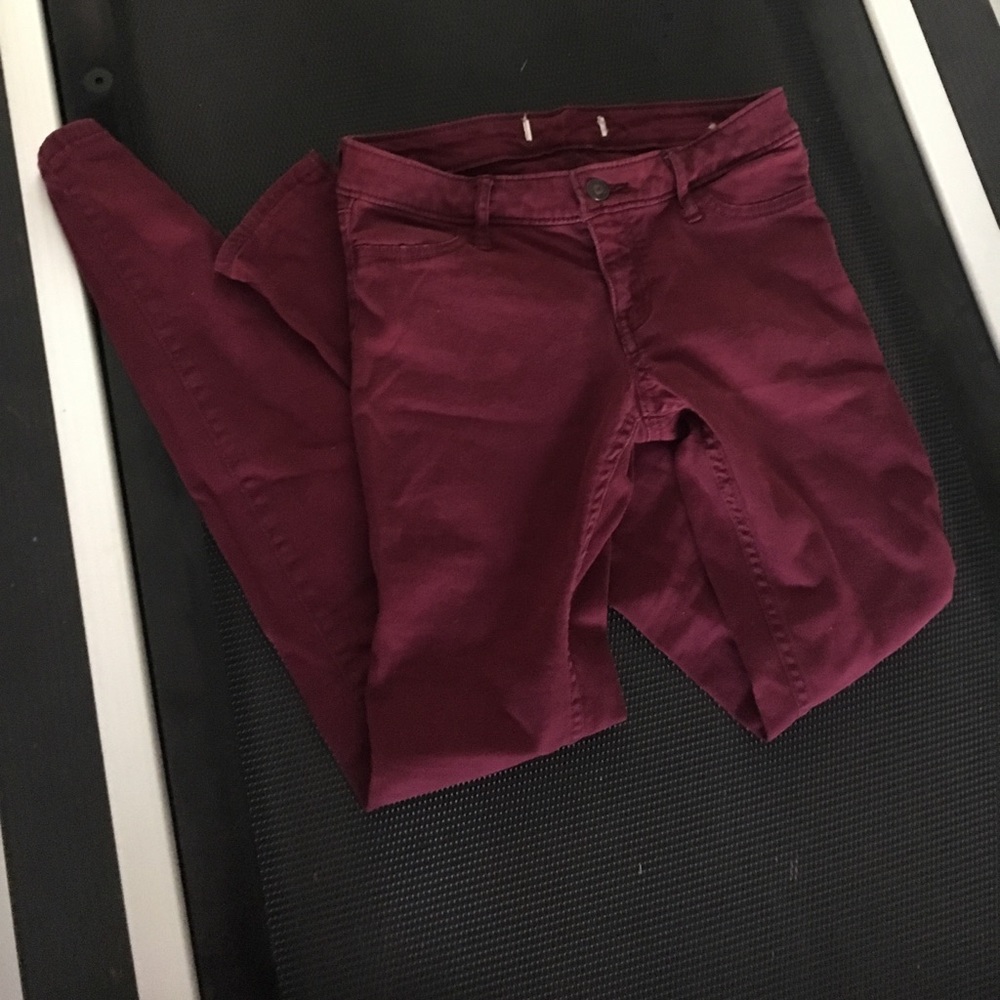 Burgundy colored skinny jeans