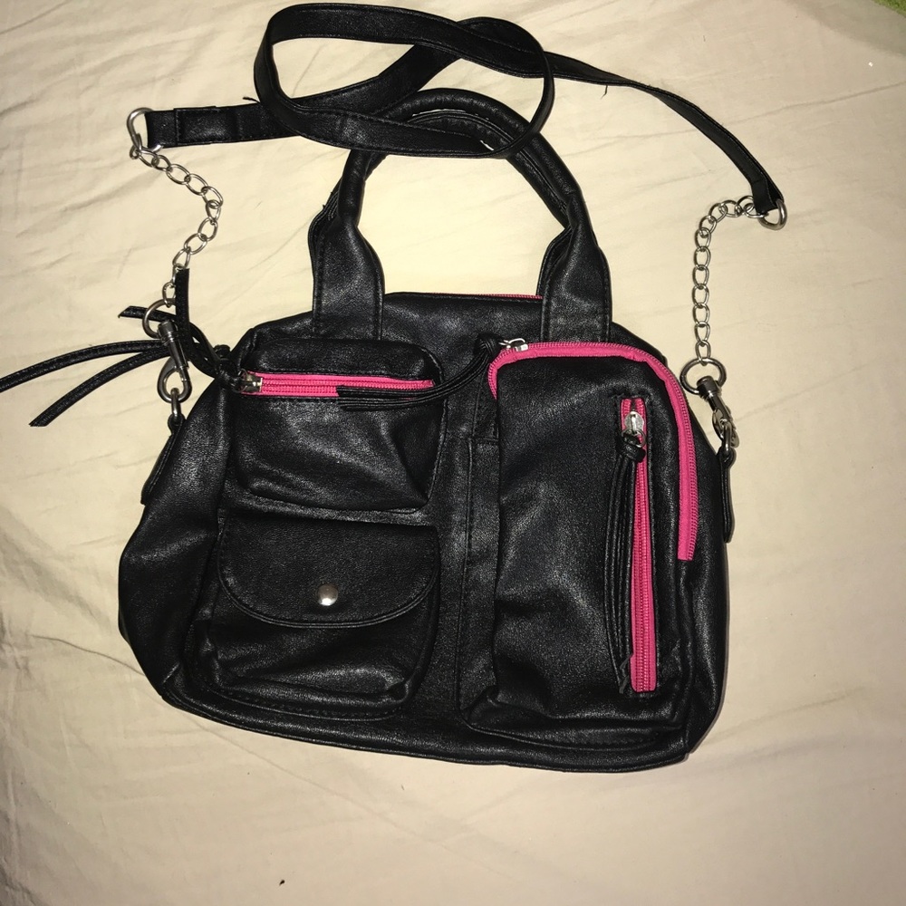Material girl purse black with pink accents.
