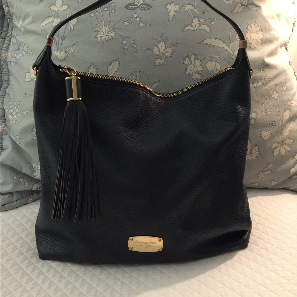 Navy blue Michael kors bag.