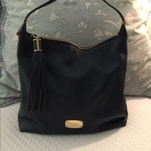 Navy blue Michael kors bag.