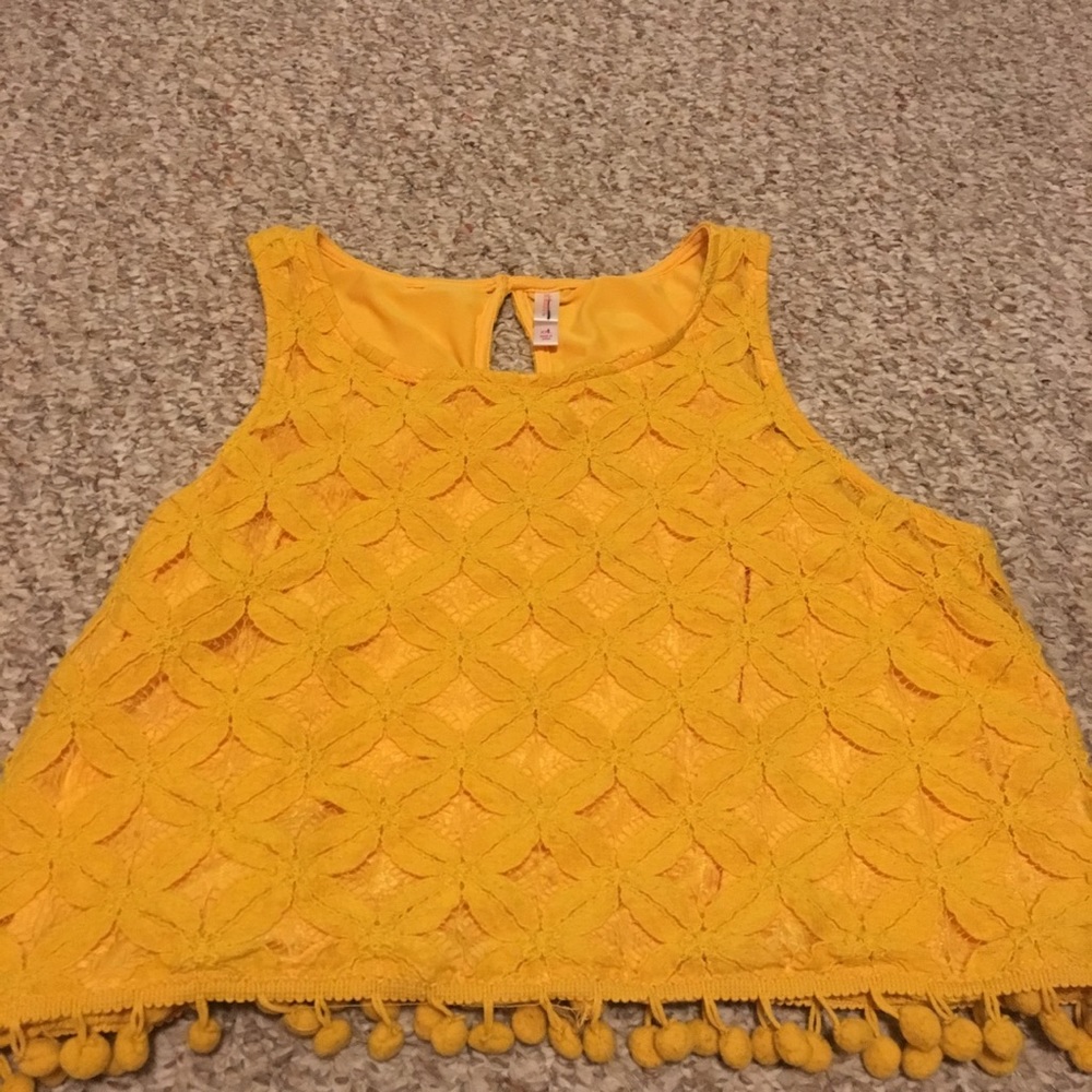 Mustard yellow crop top.