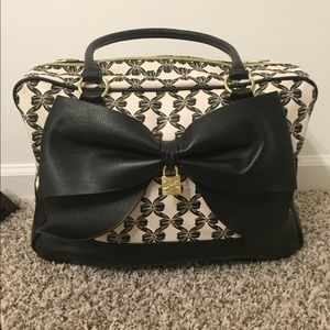 Betsy Johnson small weekend duffle.