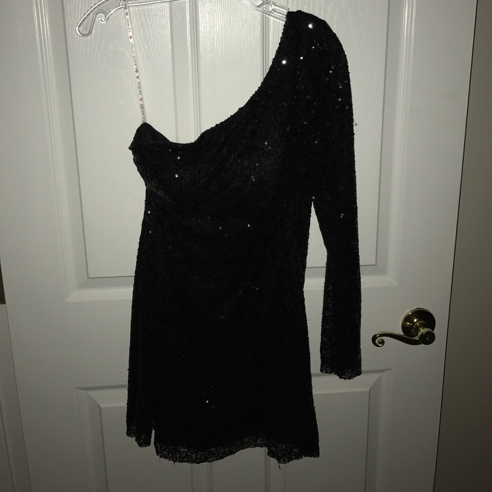 Flirt. Black sequin gown