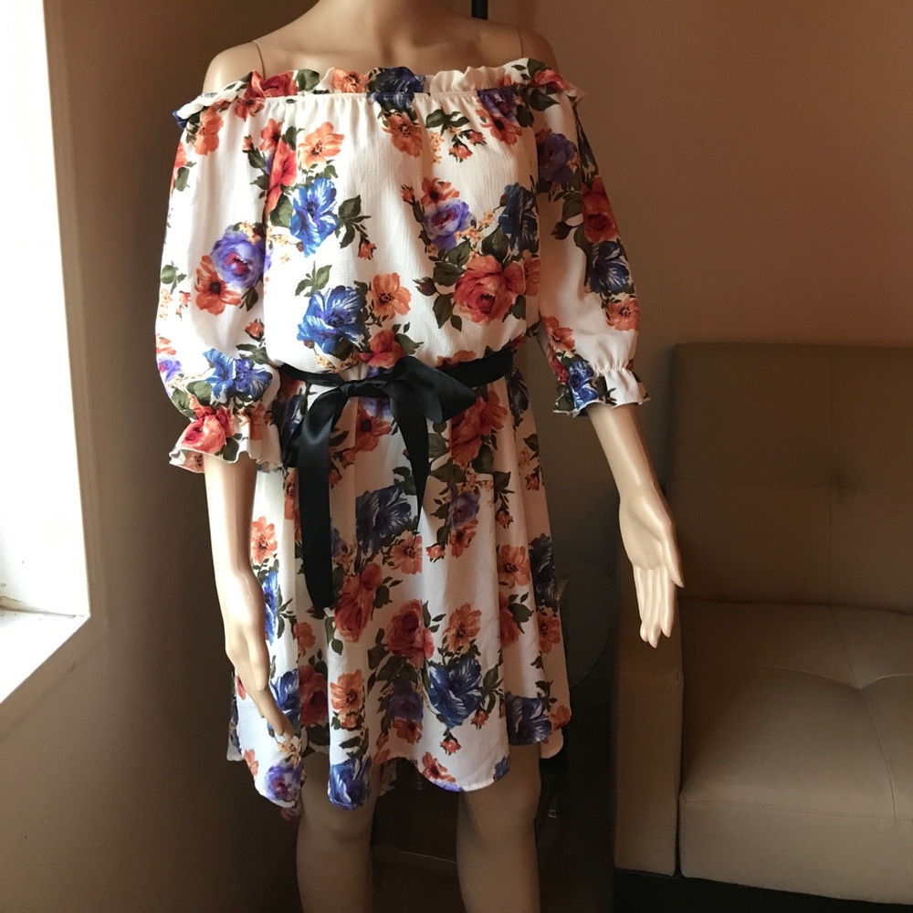 An off-shoulder dress