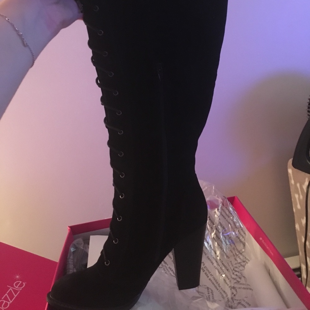 Over the knee lace up boots