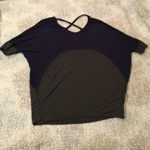 Color blocked batwing top with cross back