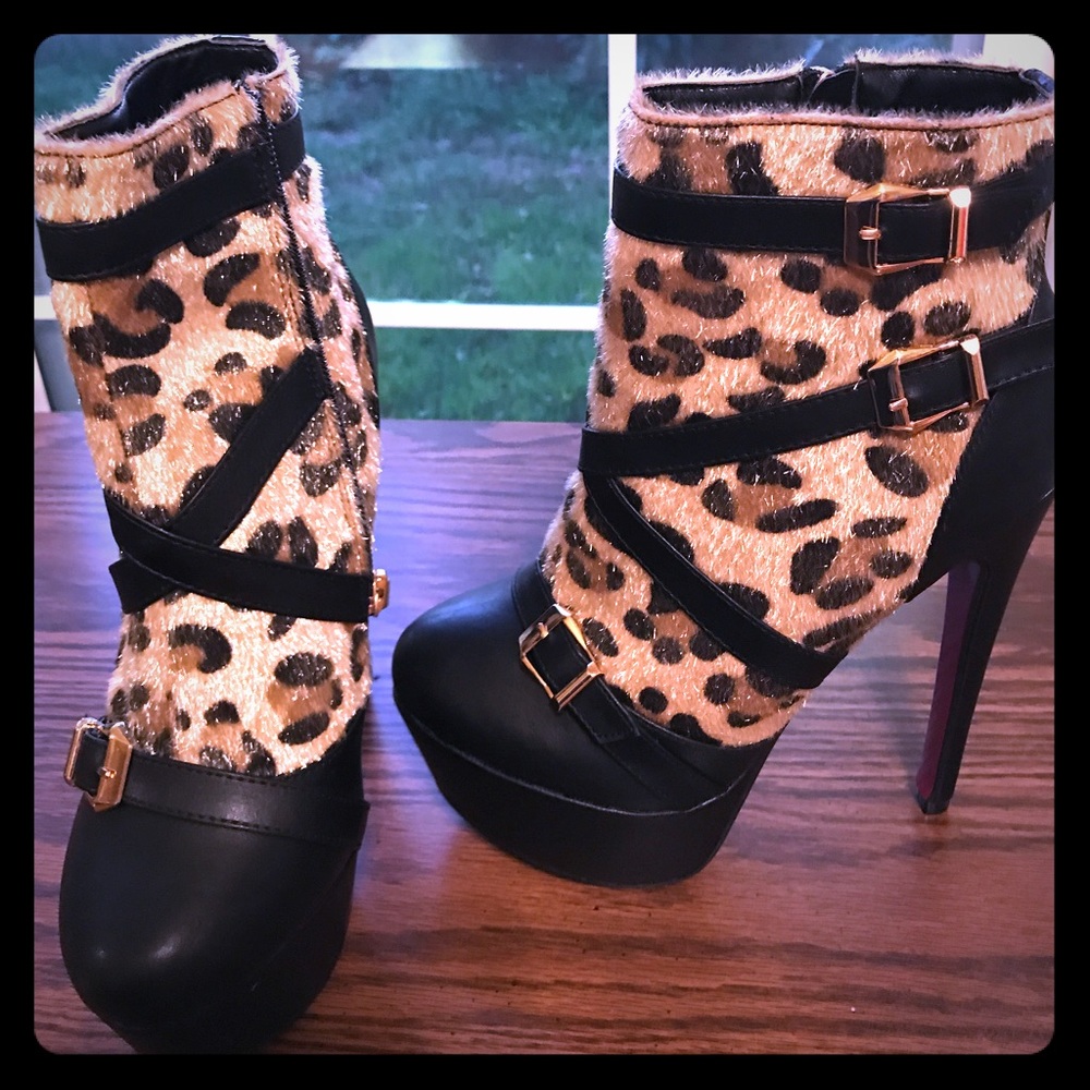 Cleopatra leopard print booties.