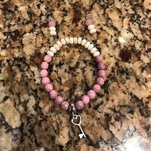 Pink and white beaded earring and bracelet set