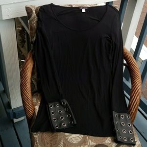 Venus black top with rivets on the wrist