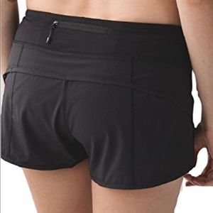 ISO BLACK OR WHITE LULULEMON SHORTS SIZE 6 !!