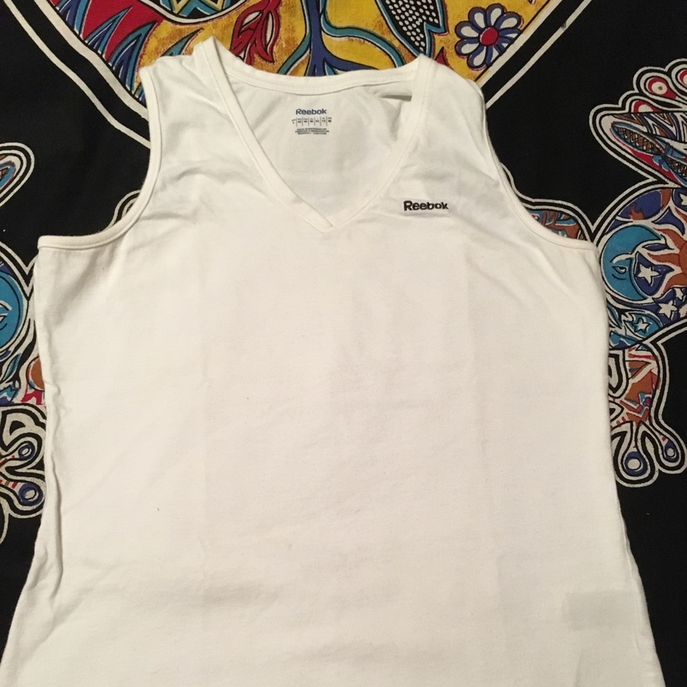 Reebok tennis tank top Junior size L or women' S