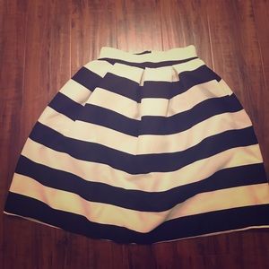 Cute black and white striped pleated skirt.