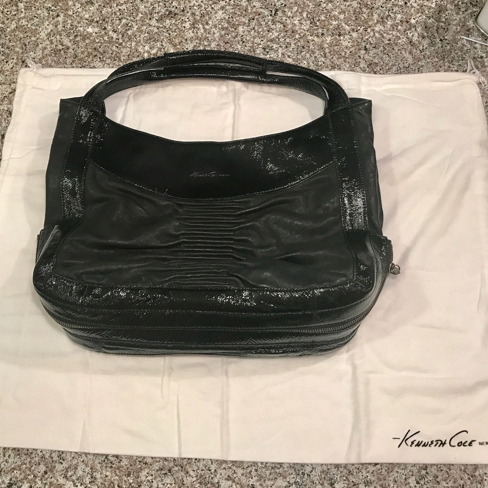 Black leather shoulder bag.