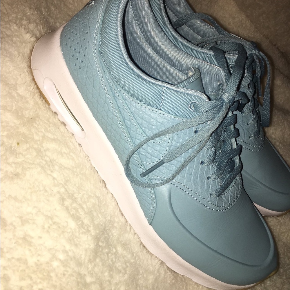 light blue leather nikes