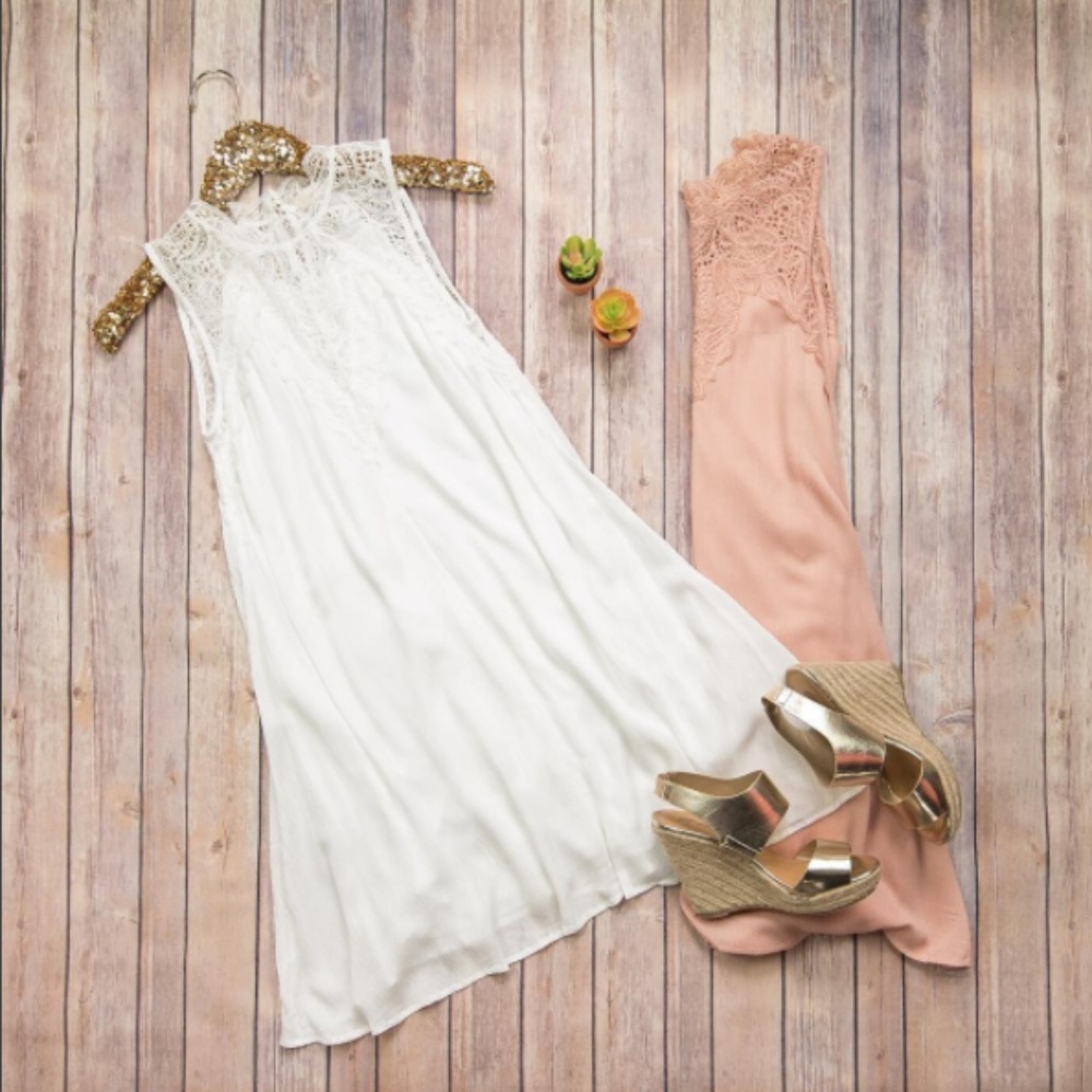 White flared dress with lace neckline detail