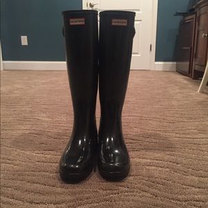Tall black Hunter rain boots