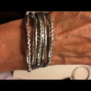 Silver bracelet w/leather strands & silver bands