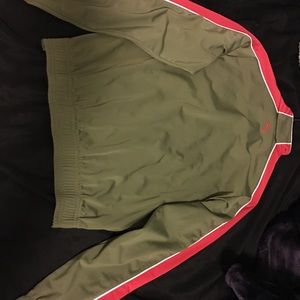 Olive green with red and white stripe. Like new.