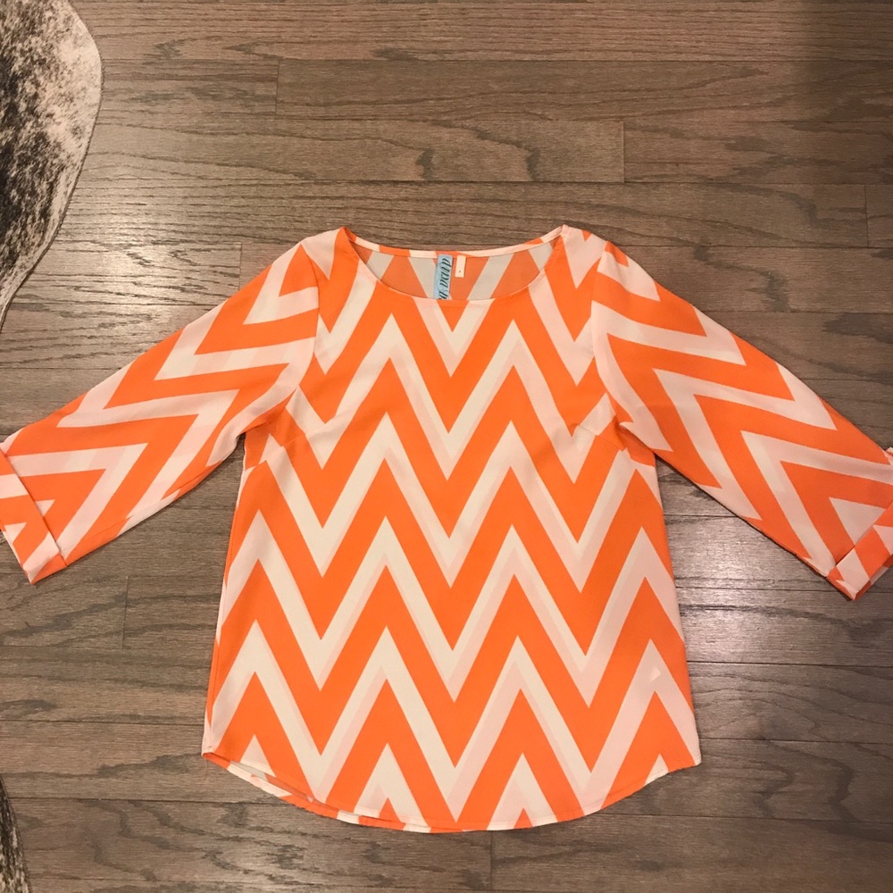 Orange and white blouse. Worn once.