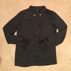 Satin black button blouse with collar detail.