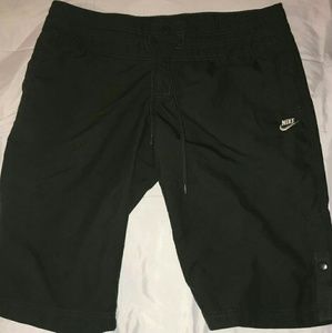 Olive green Nike preformance shorts.