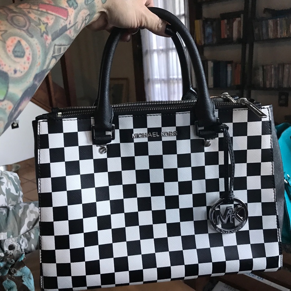 Checkered Michael Kors purse.