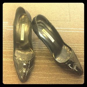 Black patent leather Manolo pumps