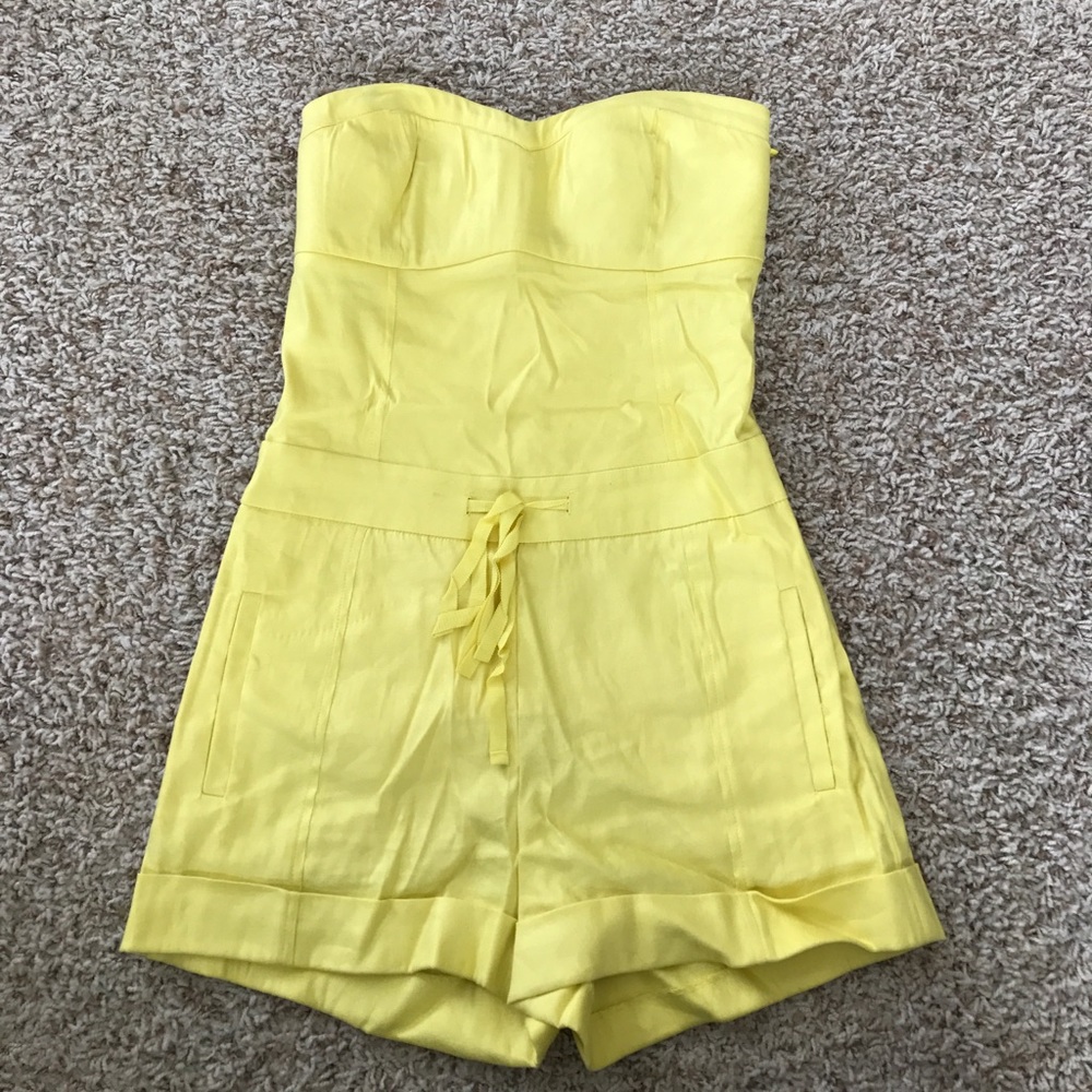 Yellow size 0 Bebe romper
