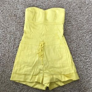 Yellow size 0 Bebe romper