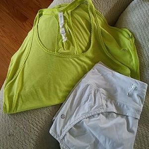 Bright yellow/tan 105 singlet with scallop edging.