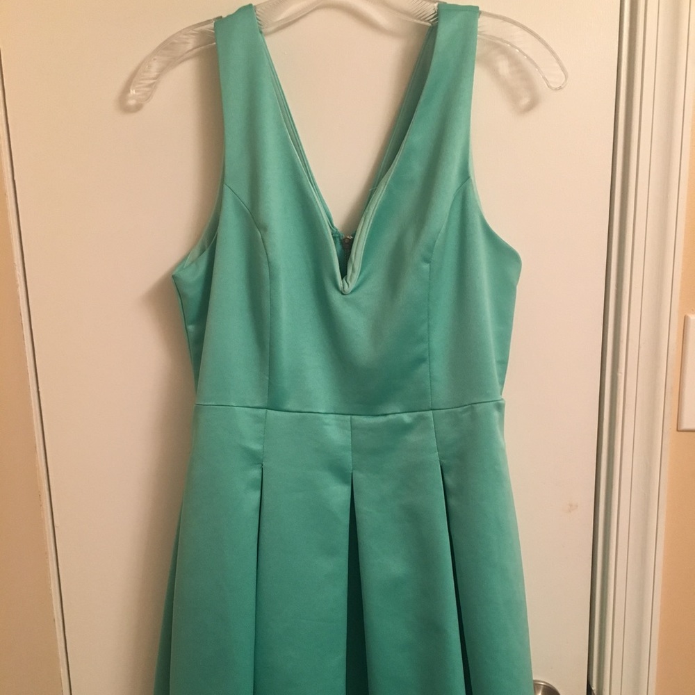 Teal boutique dress fits S/M