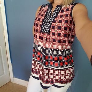 Tunic length top but looks great tucked in as well