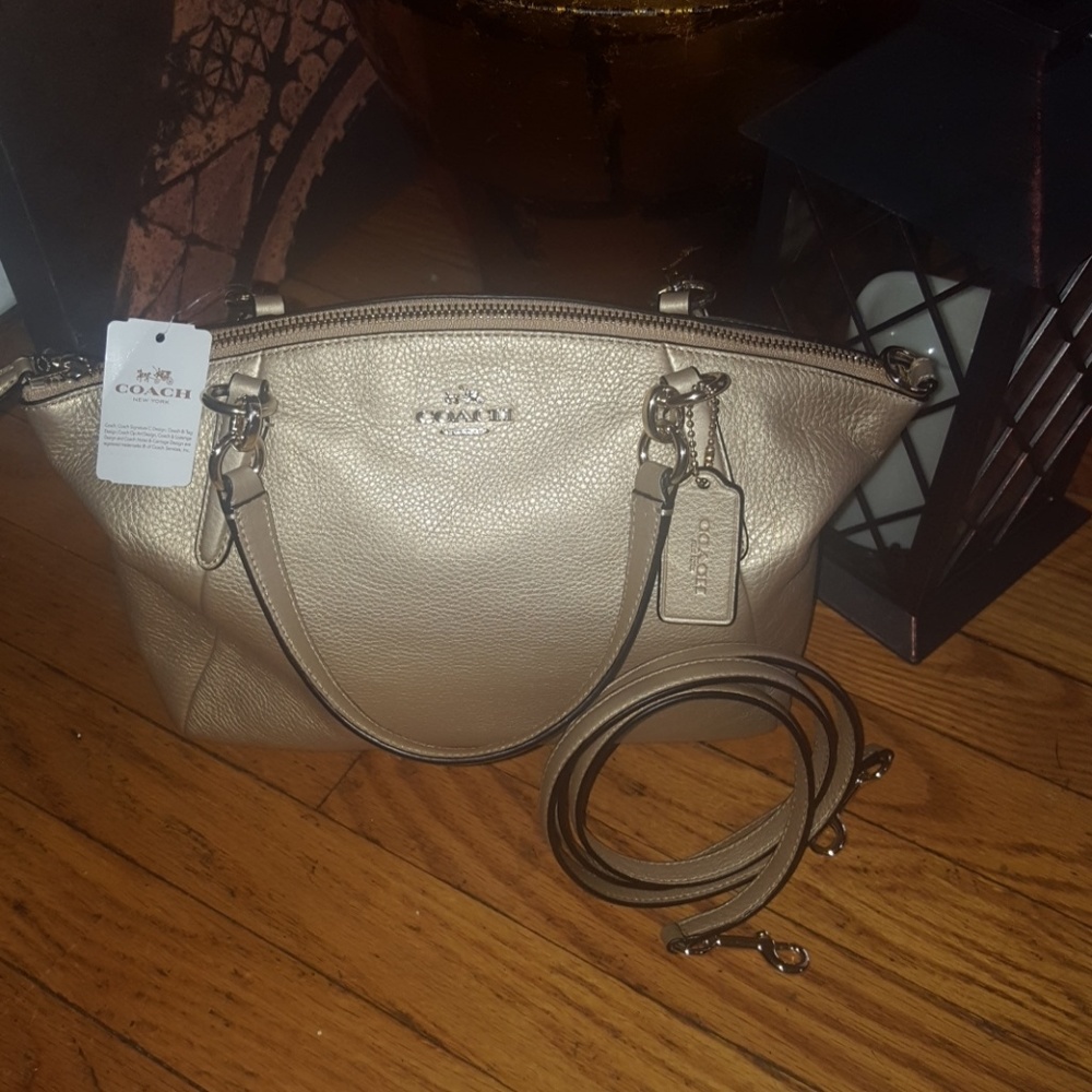 Authentic Brand new gold leather coach purse