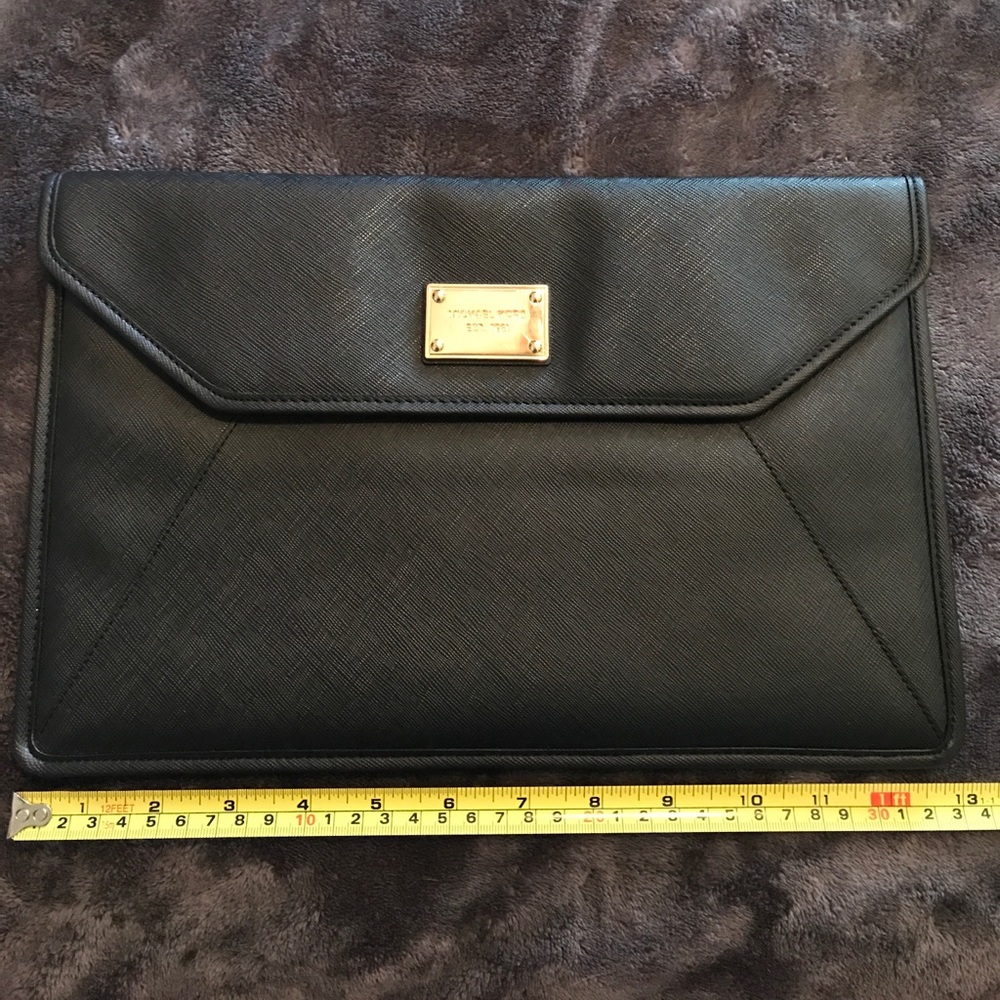 Michael Kora computer sleeve