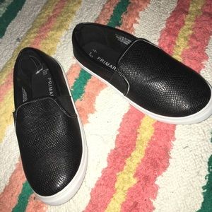 Black leather slip ons
